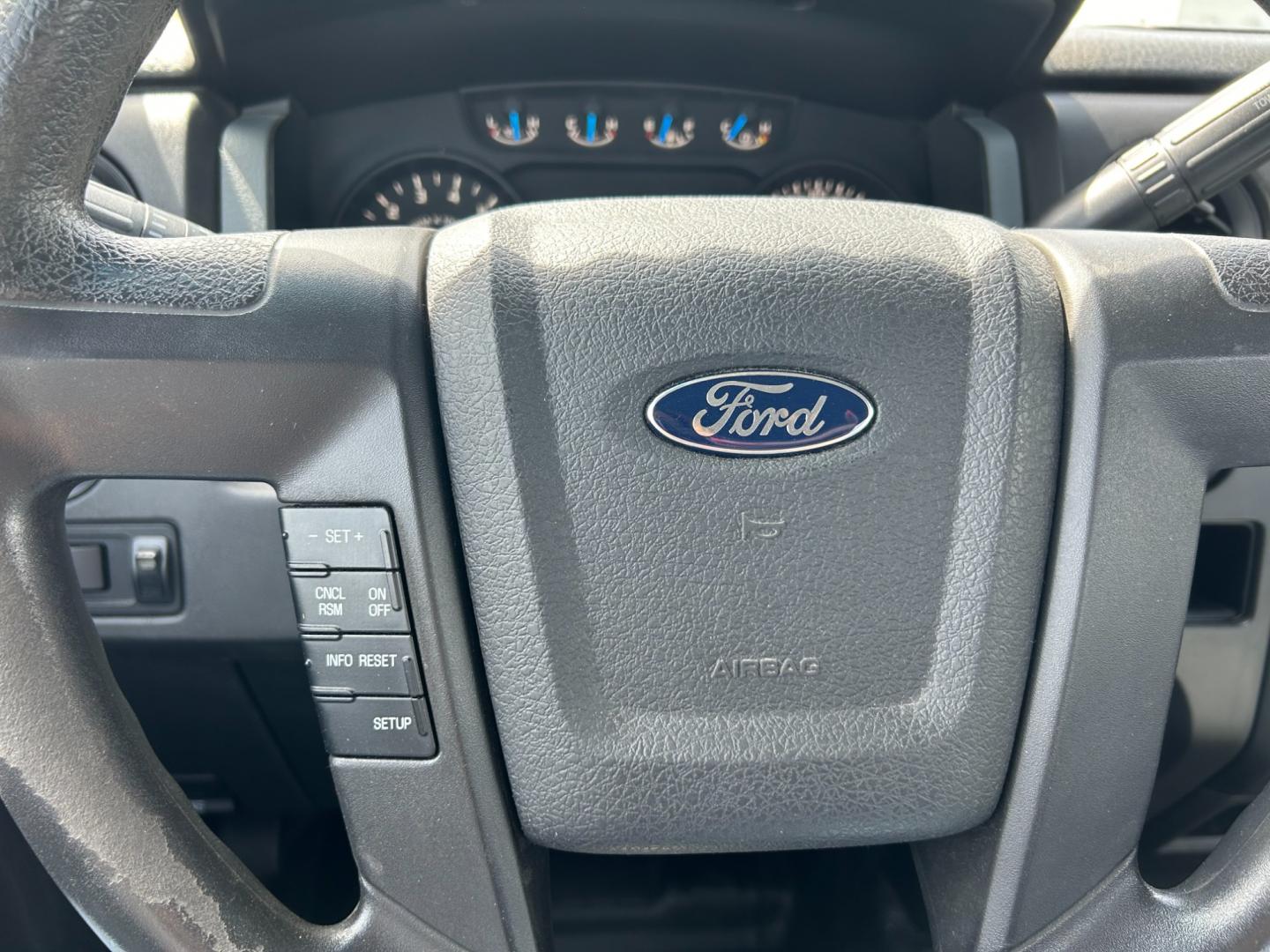 2014 White /Gray Ford F-150 (1FTMF1CM5EK) with an 3.7L V6 DOHC 24V engine, 6-Speed Automatic transmission, located at 17760 Hwy 62, Morris, OK, 74445, (918) 733-4887, 35.609104, -95.877060 - 2014 FORD F-150 XL 6.5-ft. BED HAS A 3.7L V6 ENGINGE, 2WD BI-FUEL (RUNS ON BOTH CNG OR GASOLINE) FEATURES MANUAL WINDOWS, MANUAL LOCKS, MANUAL MIRRORS, AM/FM STEREO, SIRIUS RADIO, CD PLAYER, AUXILLIARY PORT, CRUISE CONTROL, TRACTION CONTROL, MULTI-FUNCTIONING STEERING WHEEL CONTROLS, BEDLINER. IT RU - Photo#13